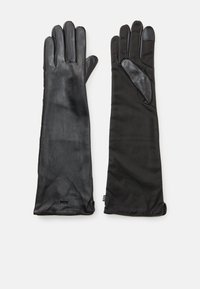 Un paio di lunghe guanti neri, uno con esterno in pelle liscia, l'altro con dorso in tessuto e palmo e punte delle dita in pelle.