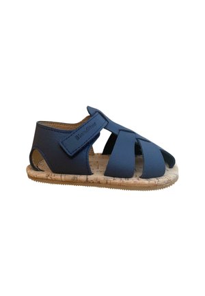 Sandalia azul marino con suela de corcho, con tiras entrecruzadas y cierre ajustable de Velcro. Diseño de talón abierto con punta redondeada.