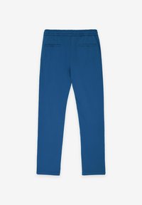 Modré sportovní kalhoty s elastickým pasem, hladkým povrchem a dvěma zadními kapsami. Rovný střih bez viditelného loga nebo vzorů.