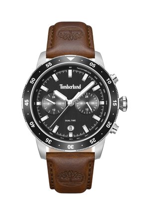 Timberland riešo laikrodis su juodu ciferblatu, dviem laiko subciferblatais, datos langeliu ties 6 valanda, sidabriniu korpusu, sukamu bezelio žiedu ir rudos spalvos odiniu dirželiu.