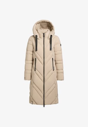 Beige puffer coat with a hood, featuring a chevron design, front zipper, and two side pockets with zippers. Textured fabric with contrast straps.