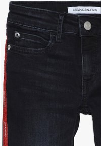Calvin Klein Jeans SKINNY MR LOGO TAPE INKY STRETCH - Jeans Skinny Fit - denim