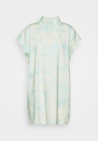 Light green tie-dye oversized t-shirt featuring a high collar, short sleeves, and a small Nike logo on the chest. Soft fabric texture.