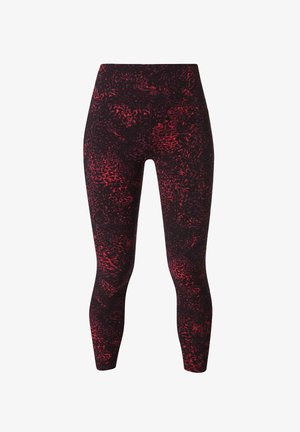 Zwarte legging met een rood abstract patroon, een hoge tailleband, gevormde naden en een nauwsluitende pasvorm, gemaakt van rekbaar, ademend materiaal.