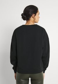 VILA VIRUST ORLEANS - Camisola - black