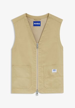 Beżowa kamizelka bez rękawów z przednim zamkiem błyskawicznym, dwiema przednimi kieszeniami, niebieską metką "HUGO" na piersi oraz jedną na kieszeni, z siateczkową podszewką wewnętrzną.