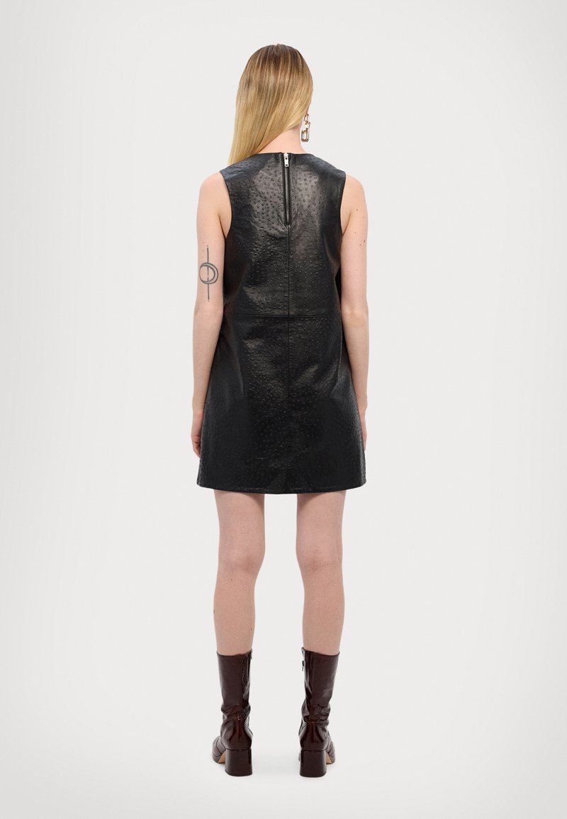 nanushka black leather dress Inara Vegan Leather Dress in Black – SVRN main image 1