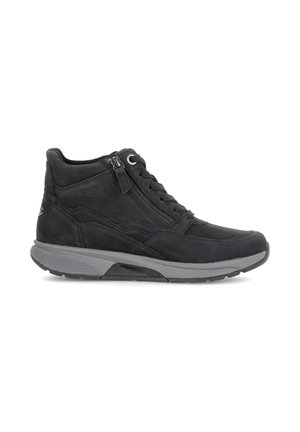 Black mid-top sneaker with lace-up front, side zipper, padded collar, and gray rubber sole shown from the outer side.