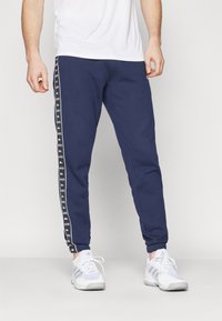 Lacoste Sport TROUSERS TAPE - Treniņtērpa apakšdaļas - navy blue