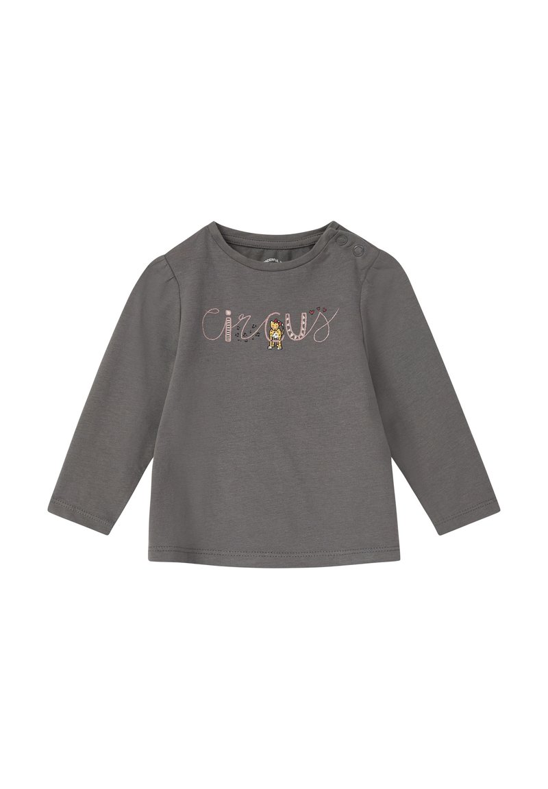 Grijze lange mouwen shirt van zacht materiaal met de tekst "circus" en een kleine leeuwafbeelding, met knoopaccenten op de schouder.