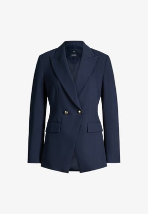 Blazer bleu marine taillé avec de larges revers, deux boutons dorés et des poches à rabat, conçu pour une silhouette ajustée.