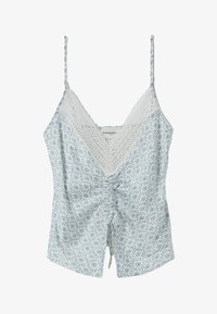 Camiseta blanca con estampado floral azul, escote en V con encaje, parte delantera fruncida y tirantes finos ajustables.