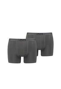 Boxer-briefs en coton gris avec un logo Levi's noir sur la ceinture élastique. Les caractéristiques incluent un design ajusté et une texture douce.