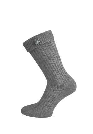 Grey knitted wool sock with a folded cuff and a small metal spider pin attached near the top.