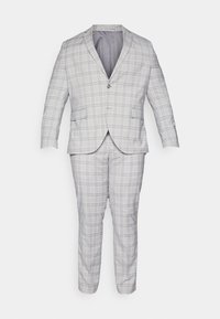 Traje de cuadros gris con blazer de botón simple y pantalones rectos. Presenta una tela ligera y texturizada con líneas sutiles en amarillo y azul.