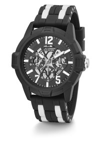 Černé gumové hodinky s kulatým ciferníkem, bílými akcenty a třemi subciferníky. Páska má střídající se černé a bílé pruhy.
