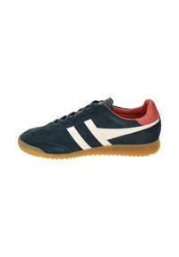 Blue suede sneaker with white stripes, red accents, and a gum rubber sole. Features rounded toe and lace-up closure.