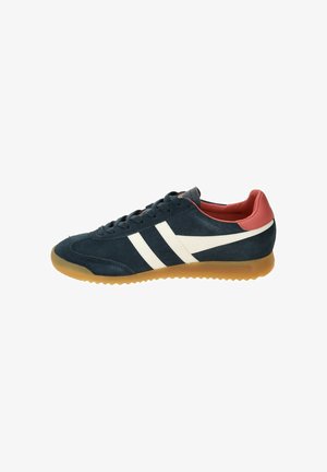 Blue suede sneaker with white stripes, red accents, and a gum rubber sole. Features rounded toe and lace-up closure.