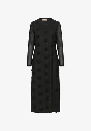 Schwarzes Kleid mit langen, transparenten Ärmeln, das aus strukturiertem Stoff mit erhabenen Blumenmustern besteht. Rundhalsausschnitt, knielang.