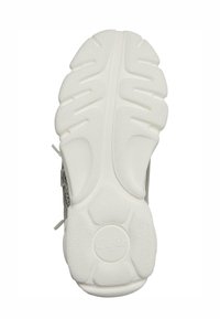 Semelle de sneaker blanche avec caoutchouc texturé, larges rainures et accents arrondis. Présente une empreinte de logo au centre.