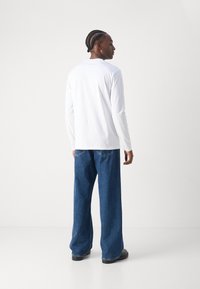 BOSS TEE LONG - Hosszú ujjú felső - white