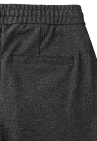 Tissu noir texturé des pantalons avec une taille élastique et une seule poche arrière rectangulaire avec un détail de surpiqûre horizontale.