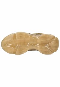 Suela de zapato con material de goma, con una suela translúcida de goma y un patrón de banda de rodadura en zigzag texturizado para agarre y tracción.
