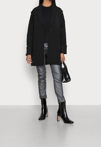 OPUS Stickad tröja - black