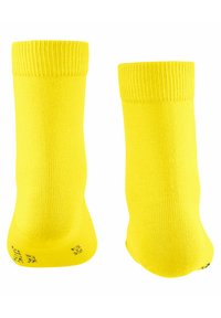 Helle, gelbe Socken mit gerippten Bündchen, hergestellt aus einem glatten, dehnbaren Material. Sie verfügen über ein nahtloses Design und verstärkte Fersen- und Zehenbereiche.