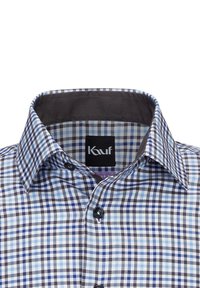 Camicia a quadri con una miscela di tonalità blu, viola e grigie. Collo classico, chiusura con bottoni e tessuto dalla consistenza liscia.