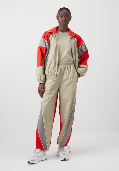 adidas by Stella McCartney PANT - Teplákové kalhoty - desert sand/active red