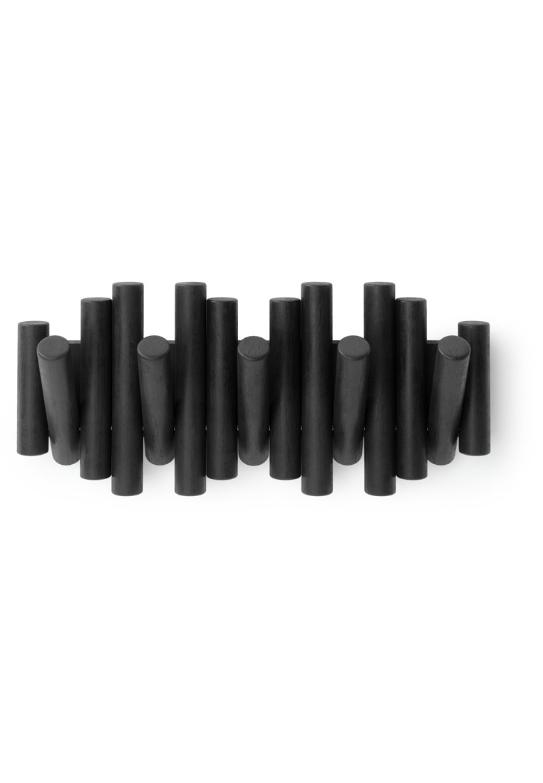 Gancio da parete per cappotti nero caratterizzato da forme e dimensioni cilindriche varie, che creano una superficie dinamica e texture.