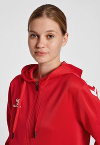 Hummel CORE XK - Sweatjacke - true red