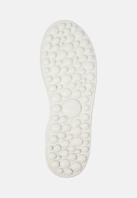 White rubber shoe sole featuring a textured surface with varying-sized circular bubbles, branded with "camper" and size "38."