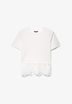 White short-sleeve top with round neck and floral lace trim extending below the hem.