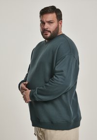 Urban Classics SWEAT CREWNECK - Melegítőfelső - bottlegreen