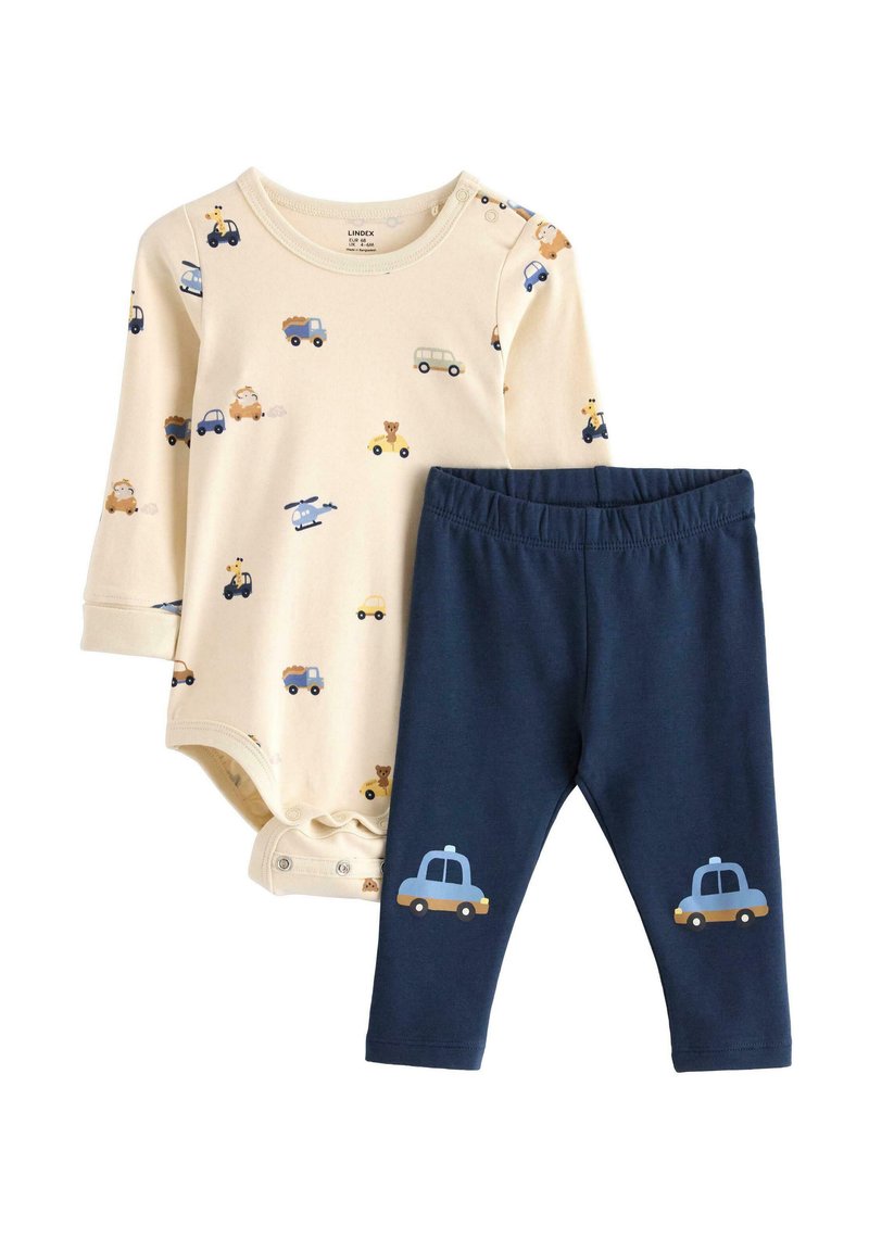 Une combinaison beige clair avec des imprimés d'animaux et de véhicules, assortie à des leggings navy comportant des graphiques de taxi bleu. Matériau en coton doux, coupe ajustée.