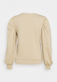 Beige sweatshirt med puffärmar, rundad halsringning och smal passform i nederkant. Slät tygstruktur, minimalistisk design.