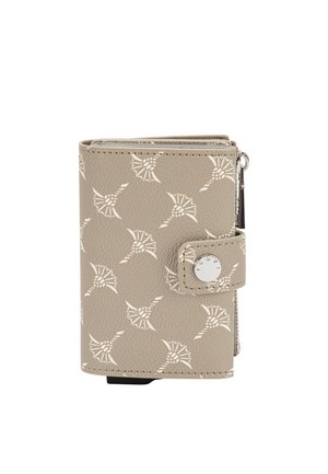 Portefeuille en cuir beige avec des motifs floraux abstraits blancs, fermeture à bouton-pression et détail zippé sur le côté.
