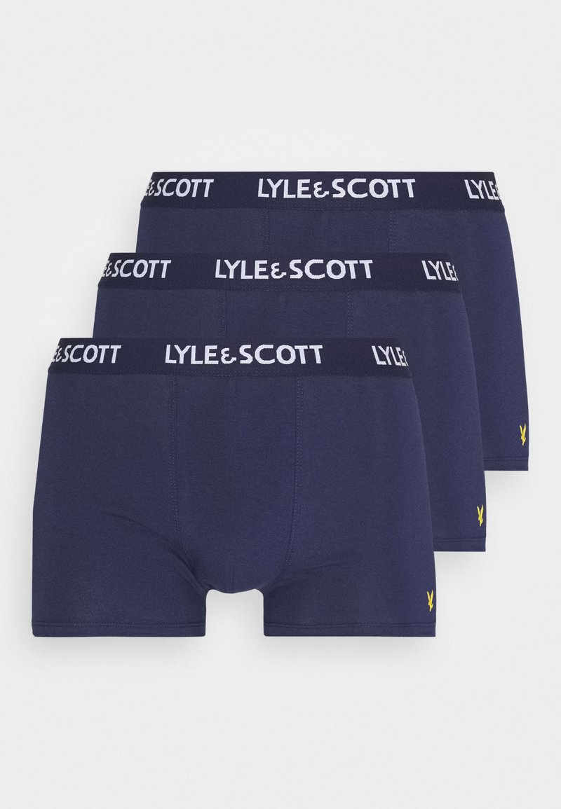 Trois paires de boxers en coton bleu marine avec une ceinture blanche à logo. Présentent un logo jaune en bas à gauche de chaque paire.