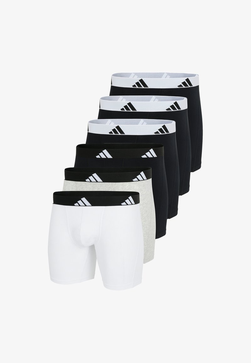 Set von sechs Boxershorts in einer Mischung aus Schwarz, Weiß und Grau. Jede hat einen elastischen, markierten Bund mit diagonalen Streifen.