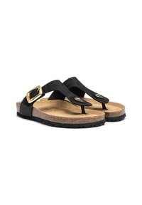 I sandali flip-flop neri in suede presentano due cinghie, una fibbia dorata, una soletta in sughero e una suola in gomma nera strutturata.