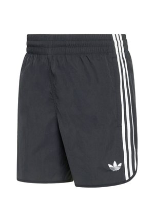 Pantalones cortos deportivos negros con una tela texturizada, que presentan tres rayas blancas a lo largo de los lados y un pequeño logotipo blanco cerca del dobladillo.