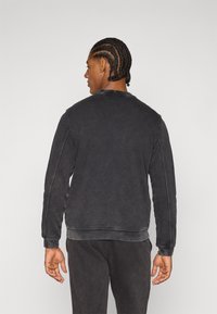 Champion ICONS CREWNECK - Sweatshirt - black