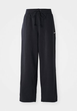 Zwarte trainingsbroek met een elastische tailleband en trekkoord, voorzien van een klein wit Nike-logo aan de linkerkant.