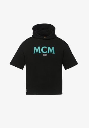 Mustat hupparit, joissa on lyhyet hihat, jossa on turkoosi "MCM" -logo ja "snipes" -teksti. Pehmeä kangas, jolla on teksturoitu pinta ja etutasku.