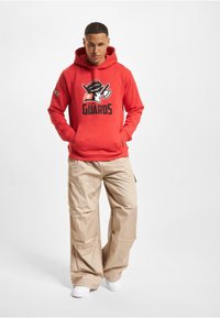 DEF ELF HELVETIC GUARDS  - Hoodie - tomato