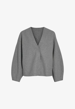 Grijze, oversized pullover met een diepe V-hals en brede, volumineuze mouwen. Gemaakt van zacht stof met een gladde textuur. Minimalistisch ontwerp.