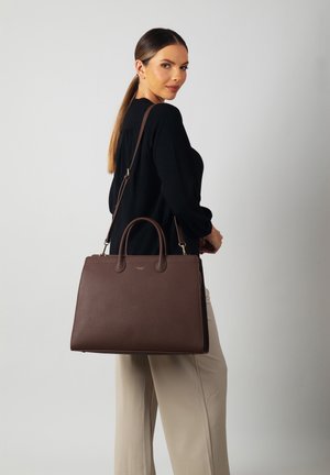 Brown leather handbag with textured surface, dual handles, and a detachable shoulder strap, featuring gold-tone hardware and a structured shape.