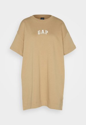 T-shirt oversize kaki en coton, avec manches courtes et logo "GAP" brodé en blanc sur le devant. Texture lisse.